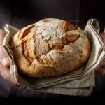 How do I bake with a pizza stone?