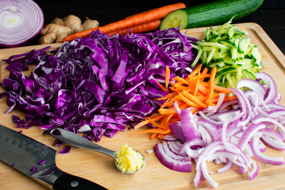 Sesame,Slaw,Ingredients,On,A,Bamboo,Cutting,Board:,Shredded,Cabbage,